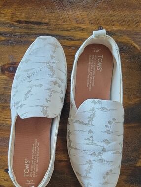 Toms Ivory Canvas Slip-On Shoes with Gold Beachy Print